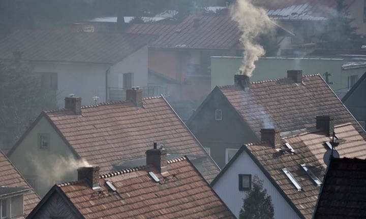 Houses and dirty smoke from the chimney